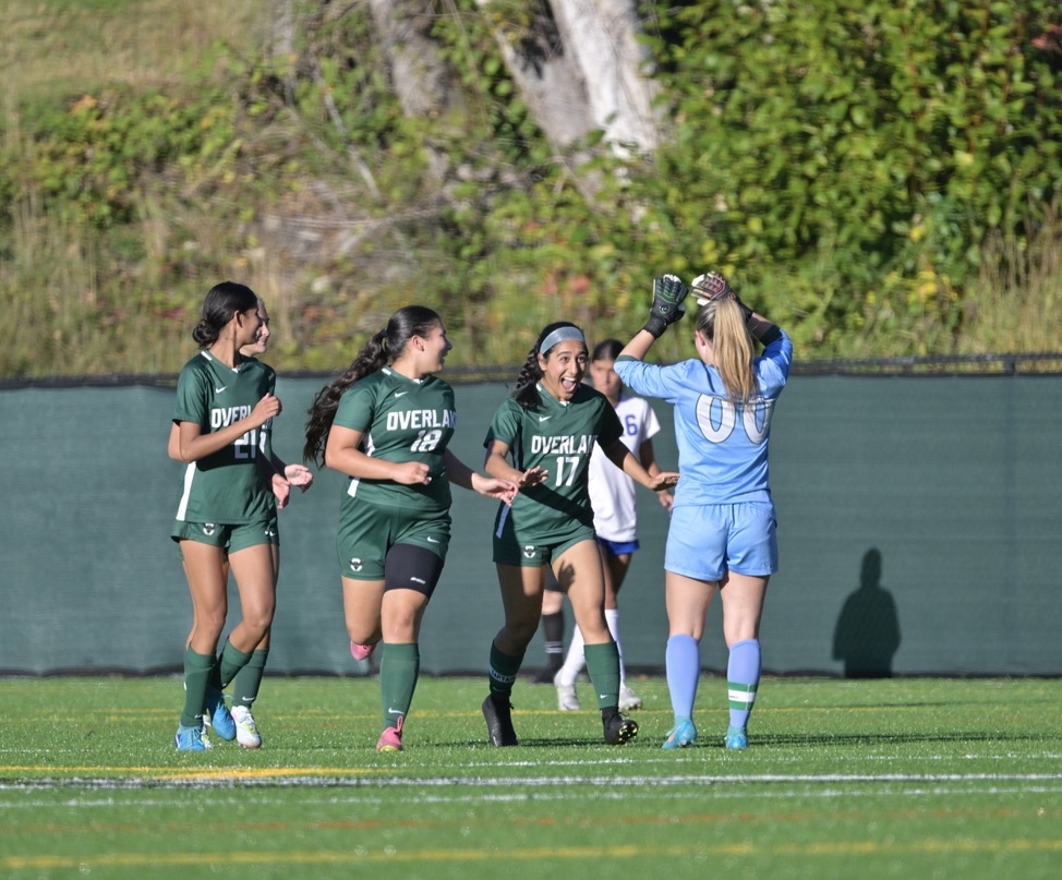 girls soccer celebrate