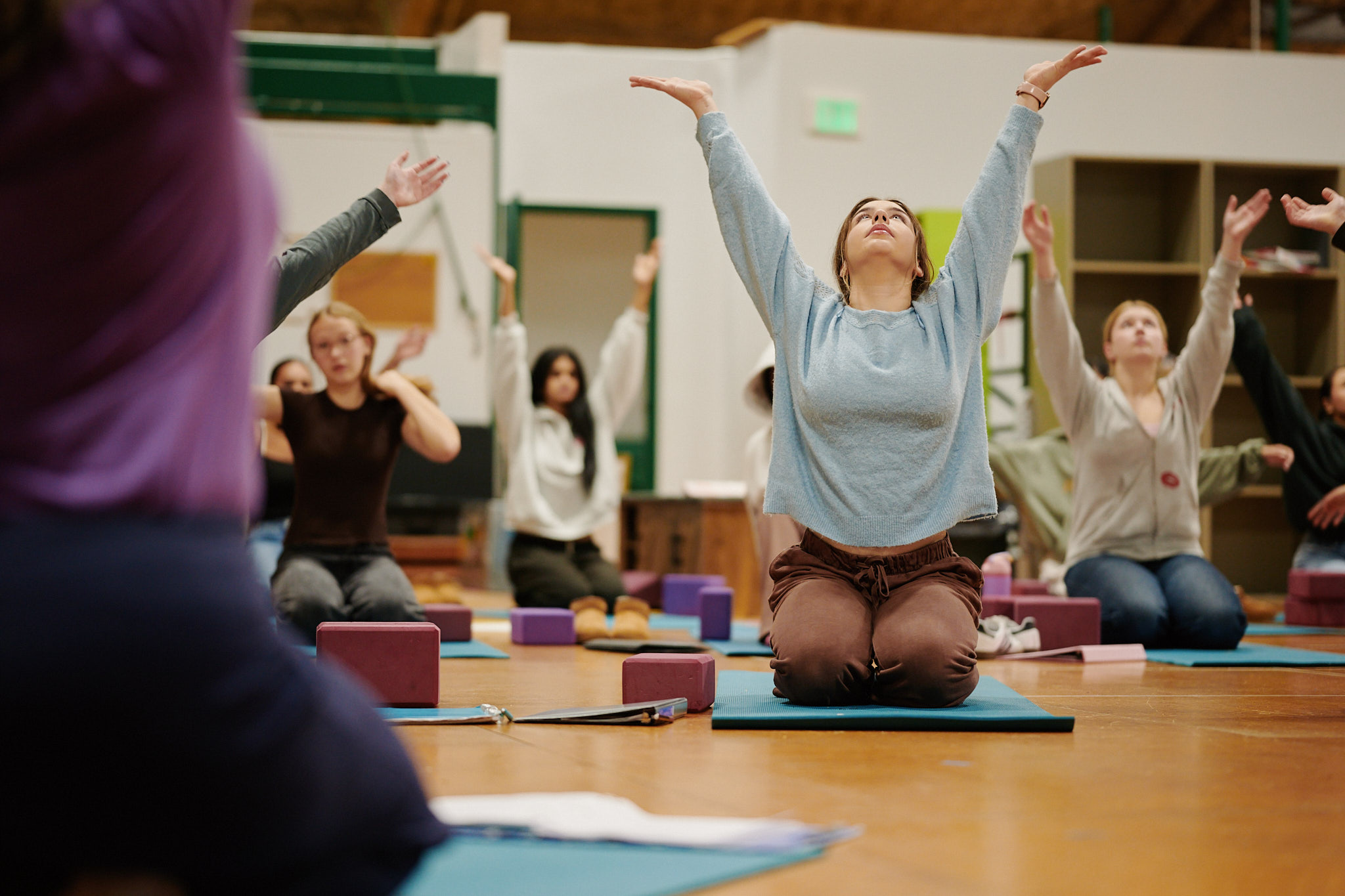 Yoga group in stretch