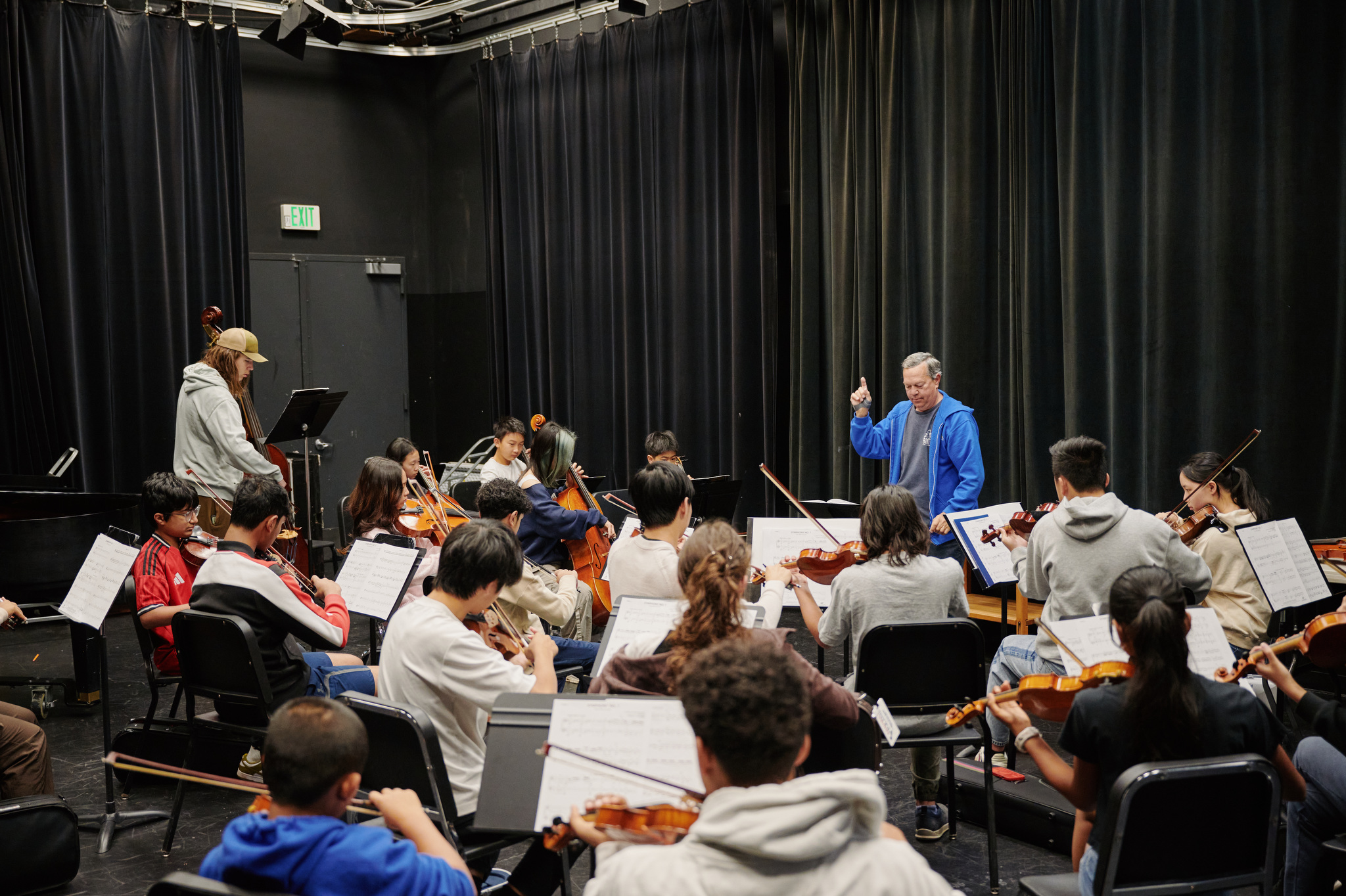 wide shot of orchestra practice