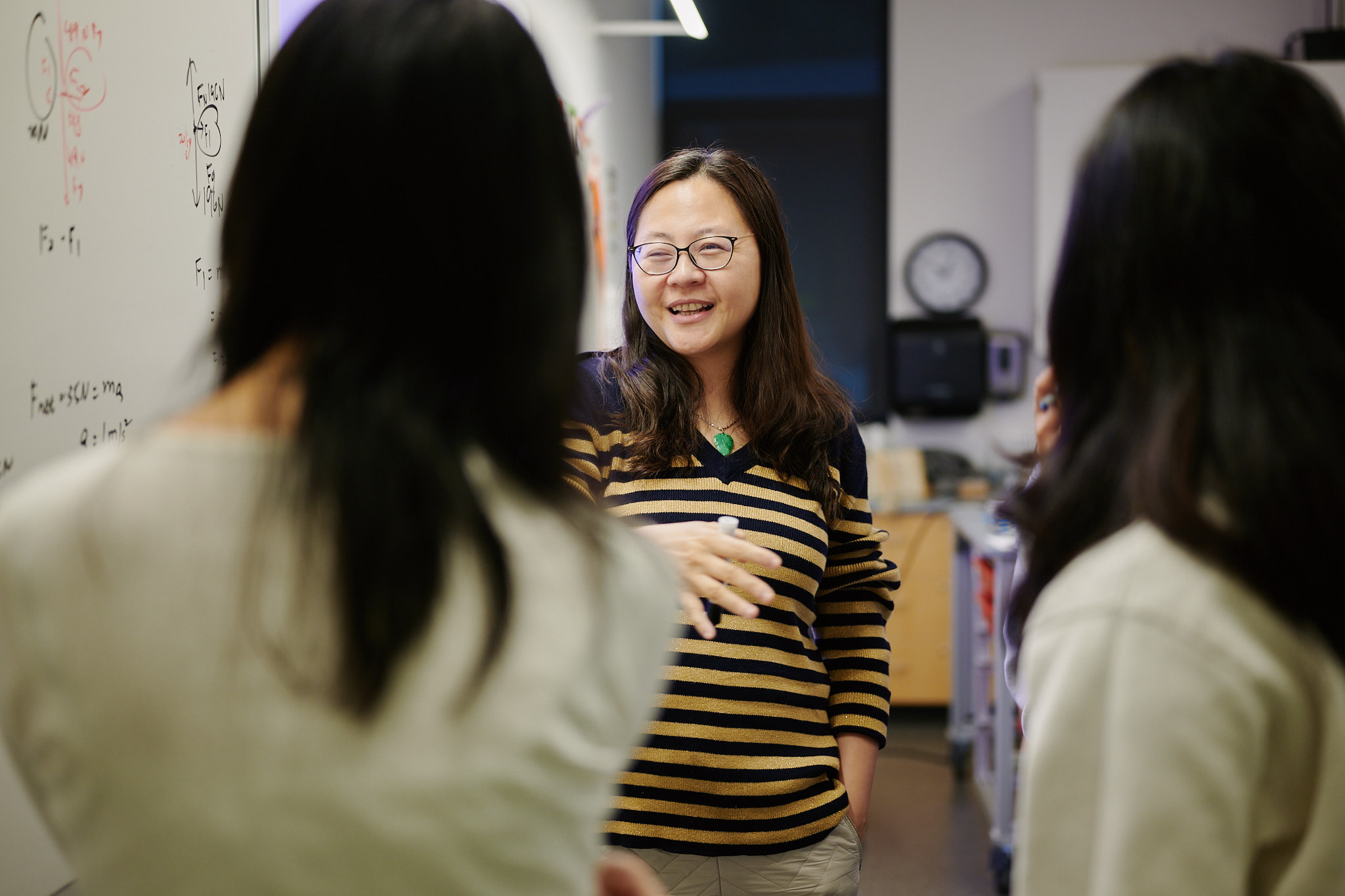 teacher smiling at student
