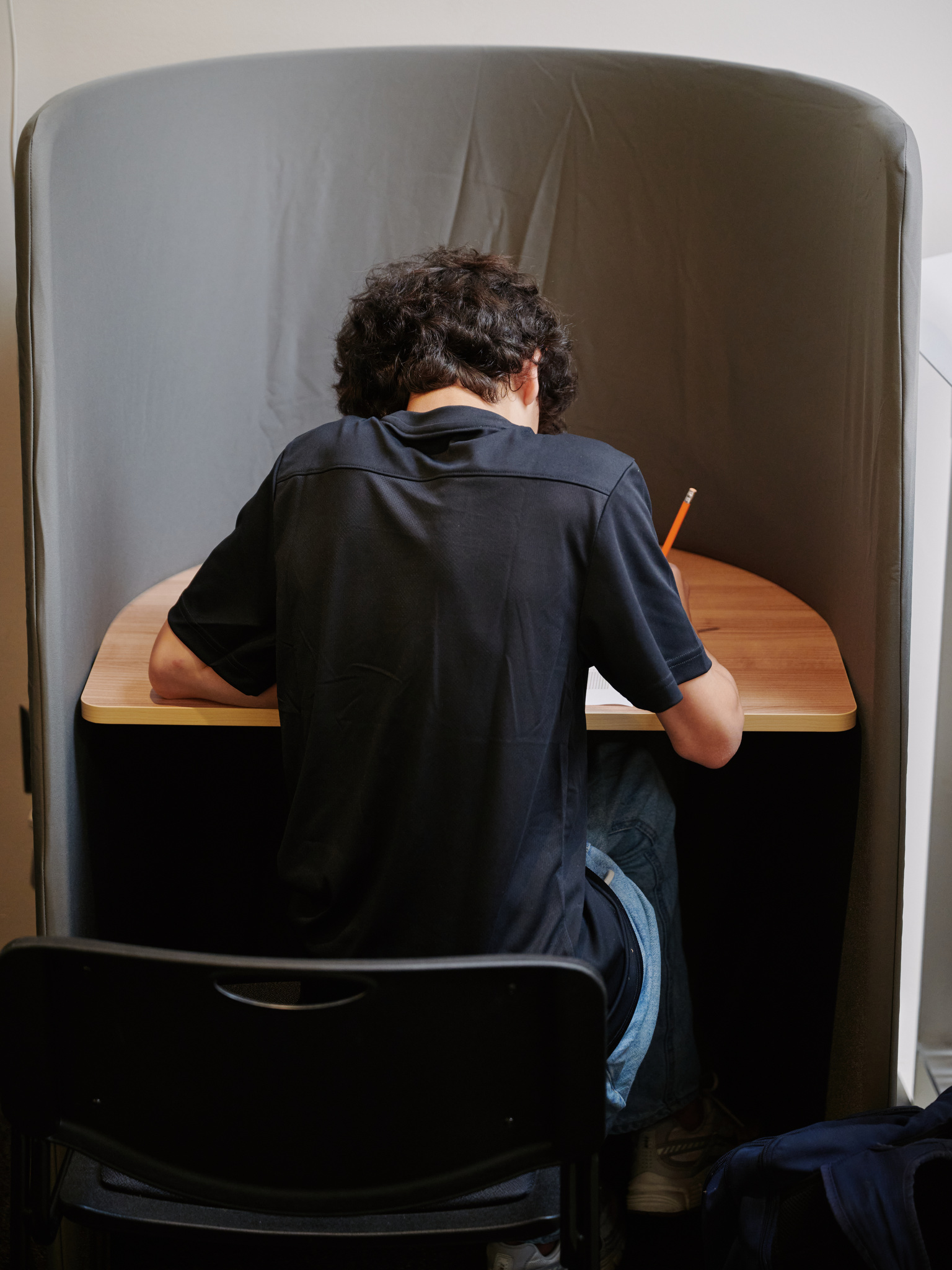 student in study cubby