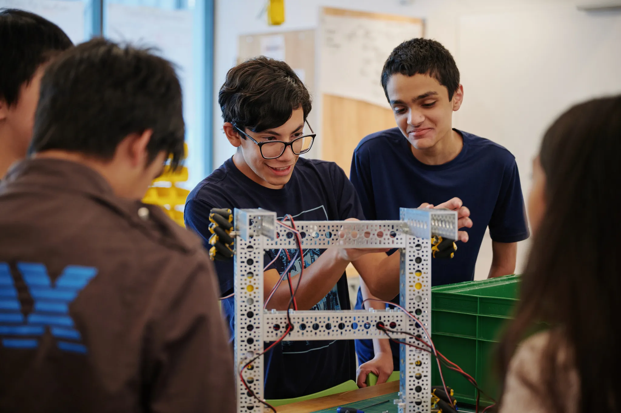 students working on robot
