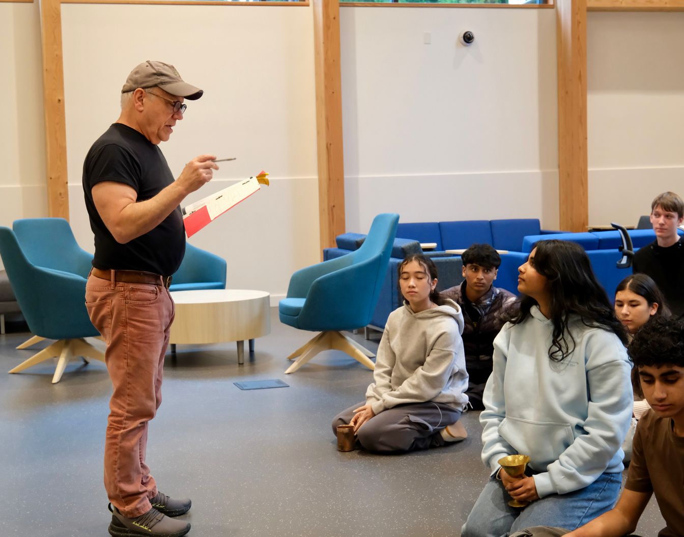 Bill Johns talking to students