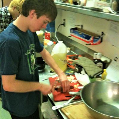 student preparing lunch