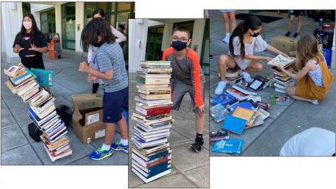 Students stacking books