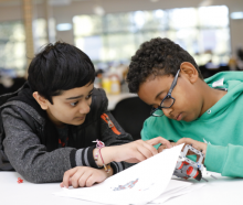 two boys doing homework