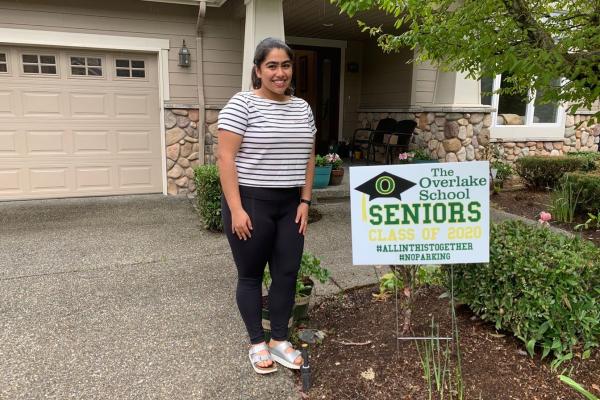 Senior with yard sign